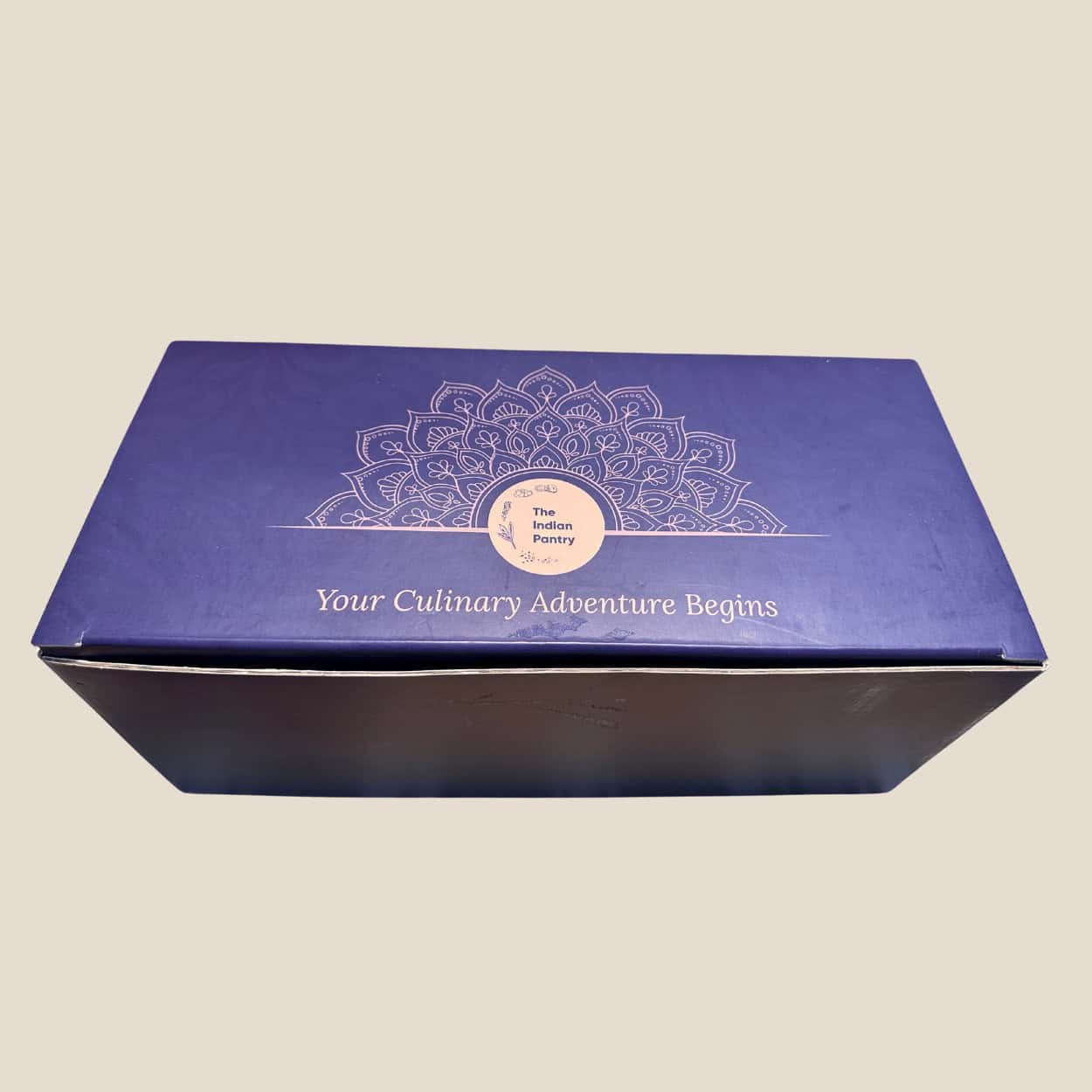 High-quality blue box featuring intricate white mandala pattern, ideal for Indian culinary ingredients and spices.